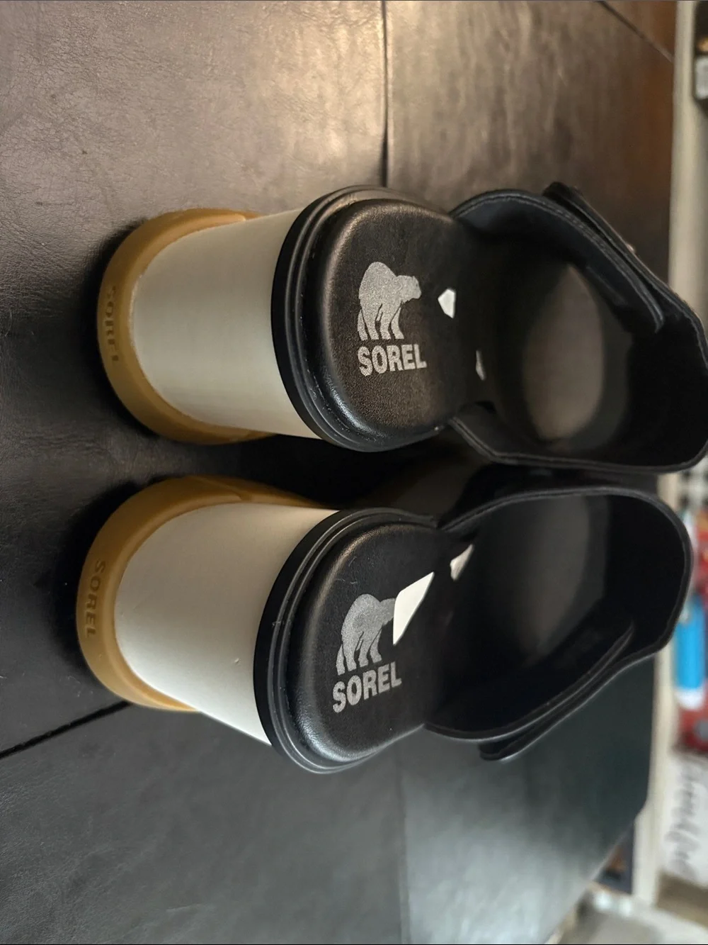 Sorel Black Slide Sandals with Red & White Stripes and Tan Sole